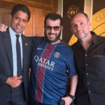 Turki Al-Sheikh, Chairman of Saudi Arabia’s General Entertainment Authority, wears a Qatar Paris Saint-Germain soccer club jersey as he meets with Qatari businessman Nasser bin Ghanim Al-Khelaifi, the President of PSG, and Michael Rubin, the CEO of digital sports platform Fanatics, on the sidelines of the FIFA Club World Cup at MetLife stadium in New Jersey yesterday. PSG defeated Real Madrid 4-0 and will play Chelsea in the final on Sunday. (Turki Al-Sheikh/ Instagram)